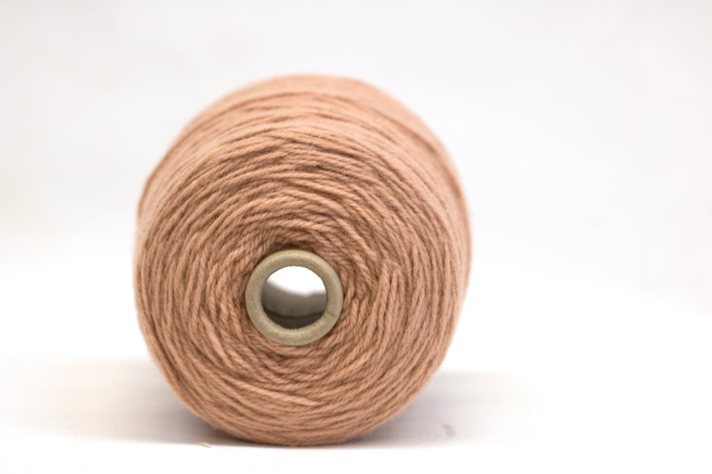 muted pink  100% rug wool on cone for tufting